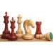 Tilted Knight Staunton chess pieces in bud rosewood, 109mm king
