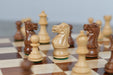 34 piece weighted Staunton chess pieces in sheesham and boxwood with two spare queens