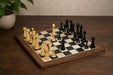 Knight carving detail on the Hermann Ohme Minimalist chess set in ebonised and boxwood