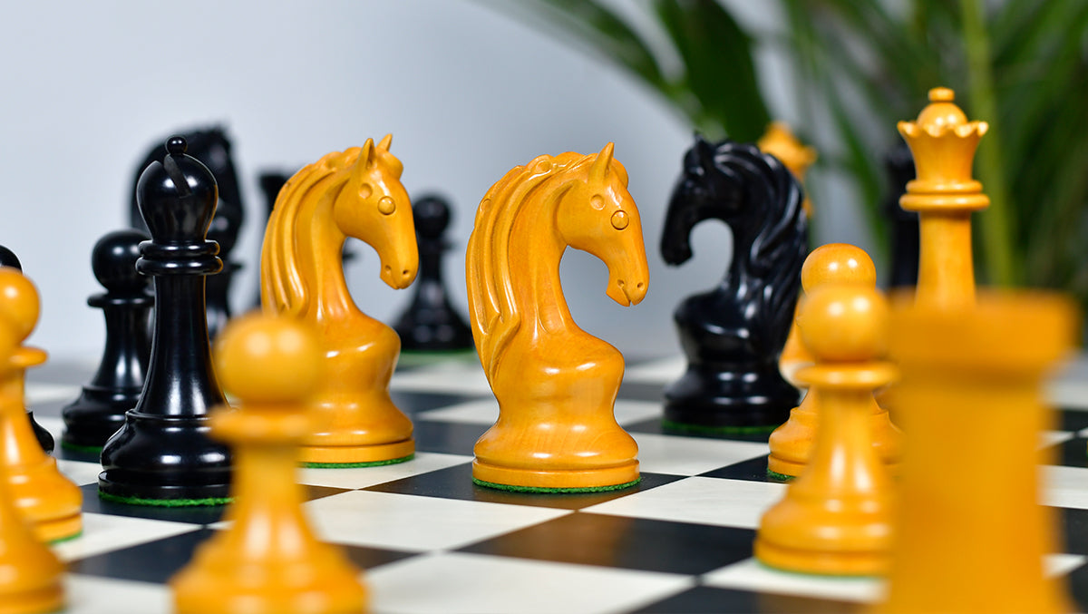 Full 34 piece 1963 1966 Piatigorsky Cup chess pieces in genuine ebony and antiqued boxwood, Sterling Chess Australia