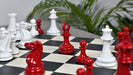 Painted crimson chess pieces with a 115mm king and weighted felted bases