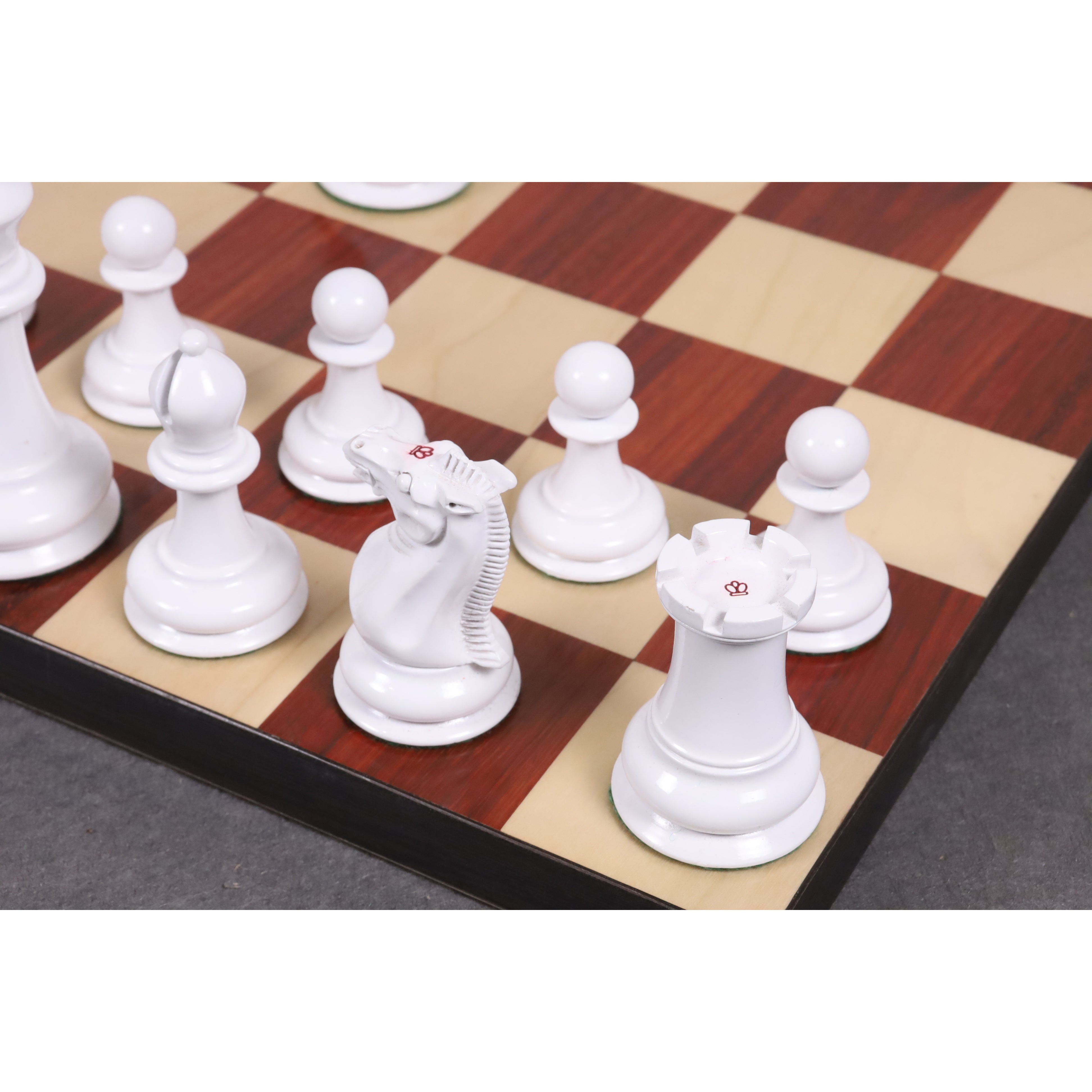 White lacquered knight and rook in close detail