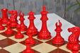 Painted crimson and ivory white Staunton chess pieces, 4.52 inch king