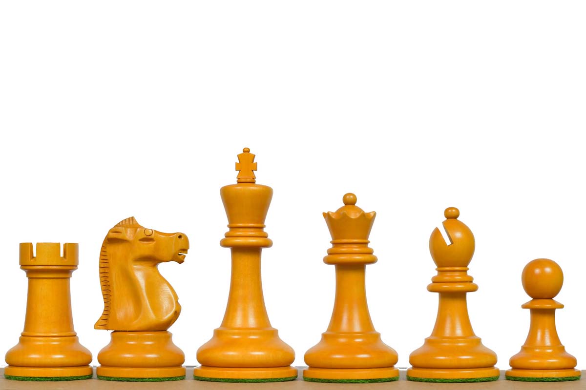 1972 Fischer Spassky chess pieces in ebonised and antique boxwood, 96mm king