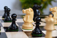 Reproduction Fischer Spassky Staunton pieces in natural boxwood, 96mm king