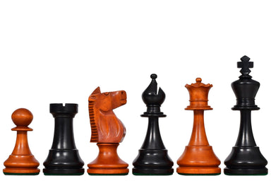 Sterling Chess 1973 Philippines Tournament chess pieces in ebonised and distressed antique boxwood, 106mm king