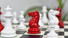 Full 34 piece 1849 Original Staunton chess pieces in painted crimson and ivory, Sterling Chess Australia
