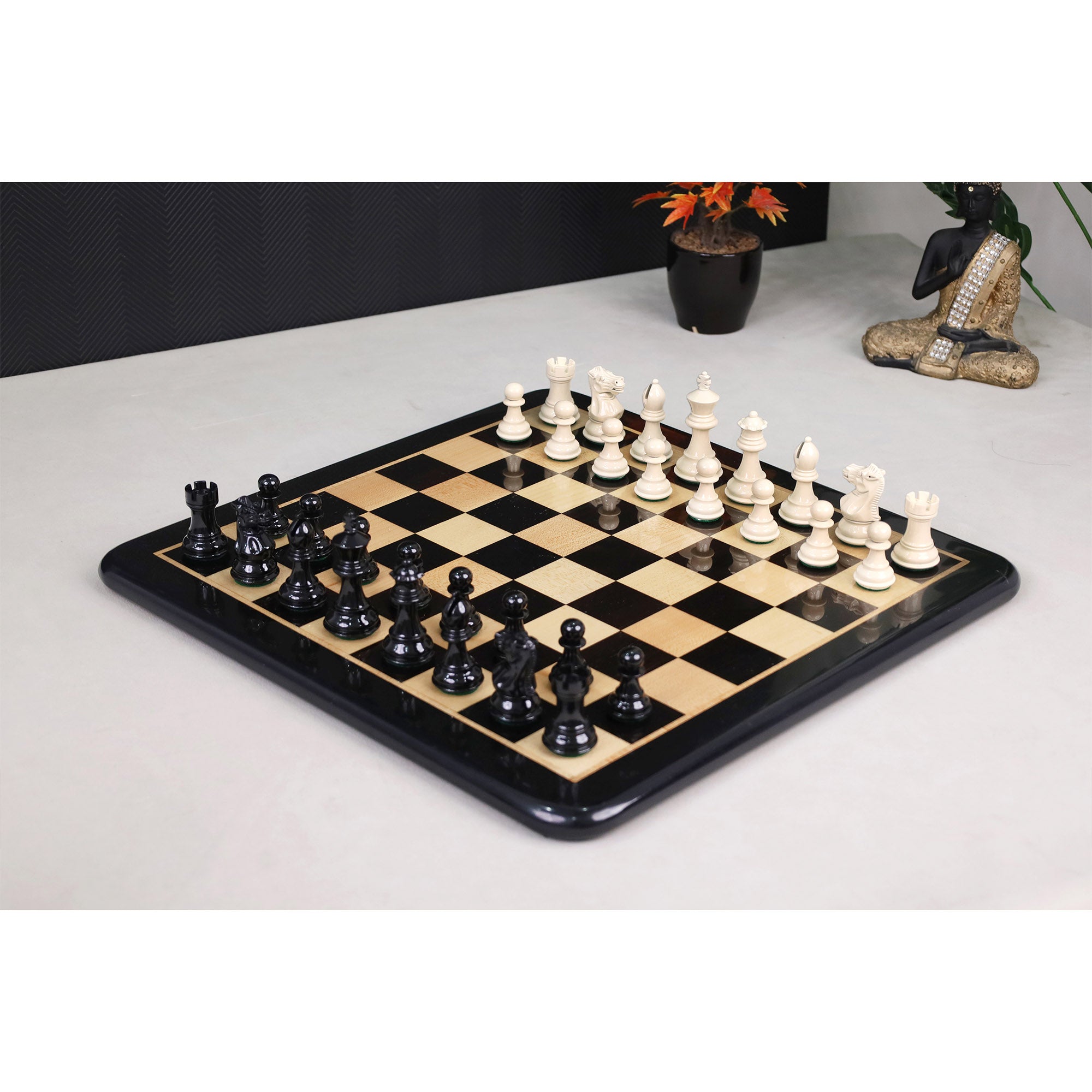 Black Painted Boxwood and Ivory Painted Boxwood chessmen, 78mm king