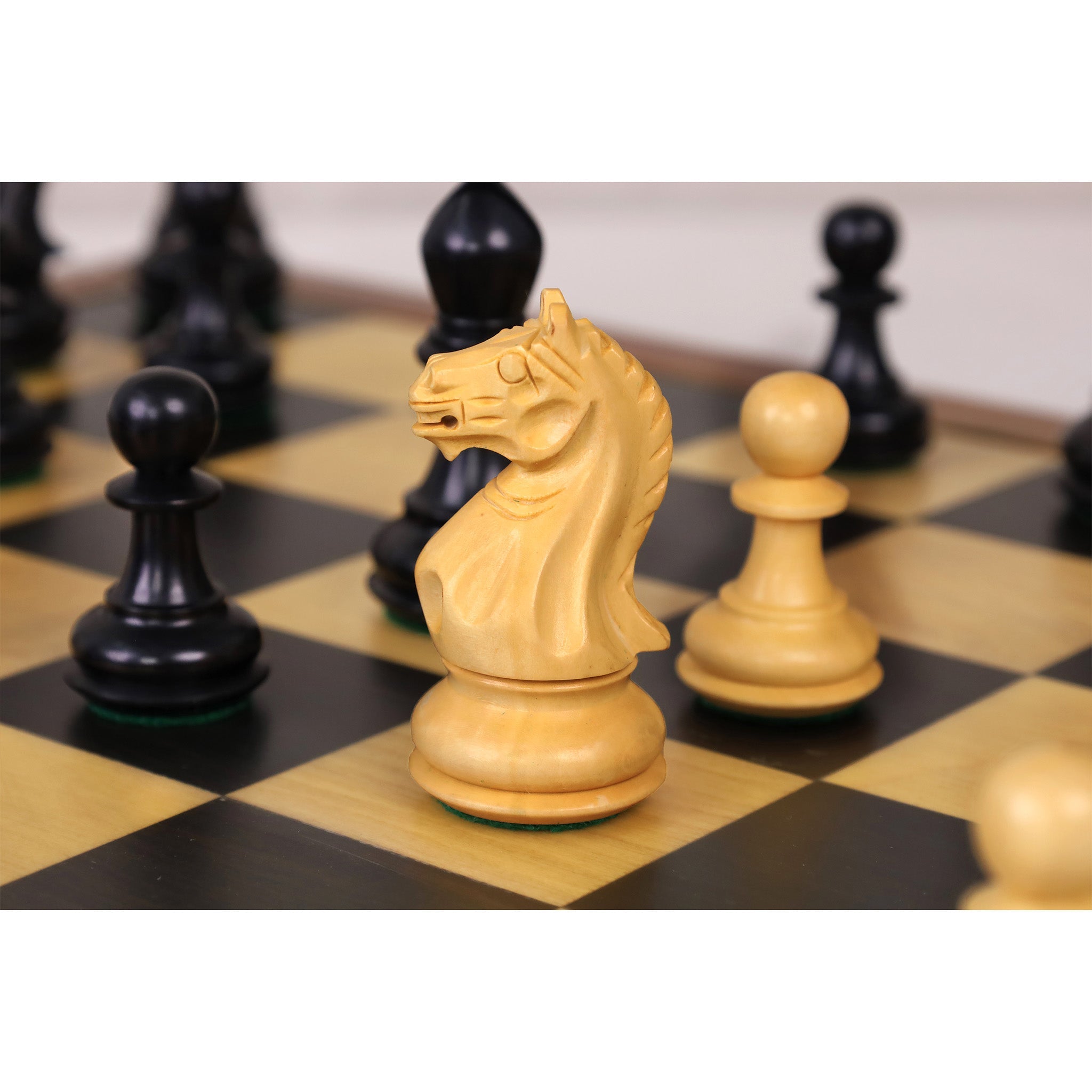 Ebonised Boxwood and Boxwood chessmen sized for 50 to 55 mm squares