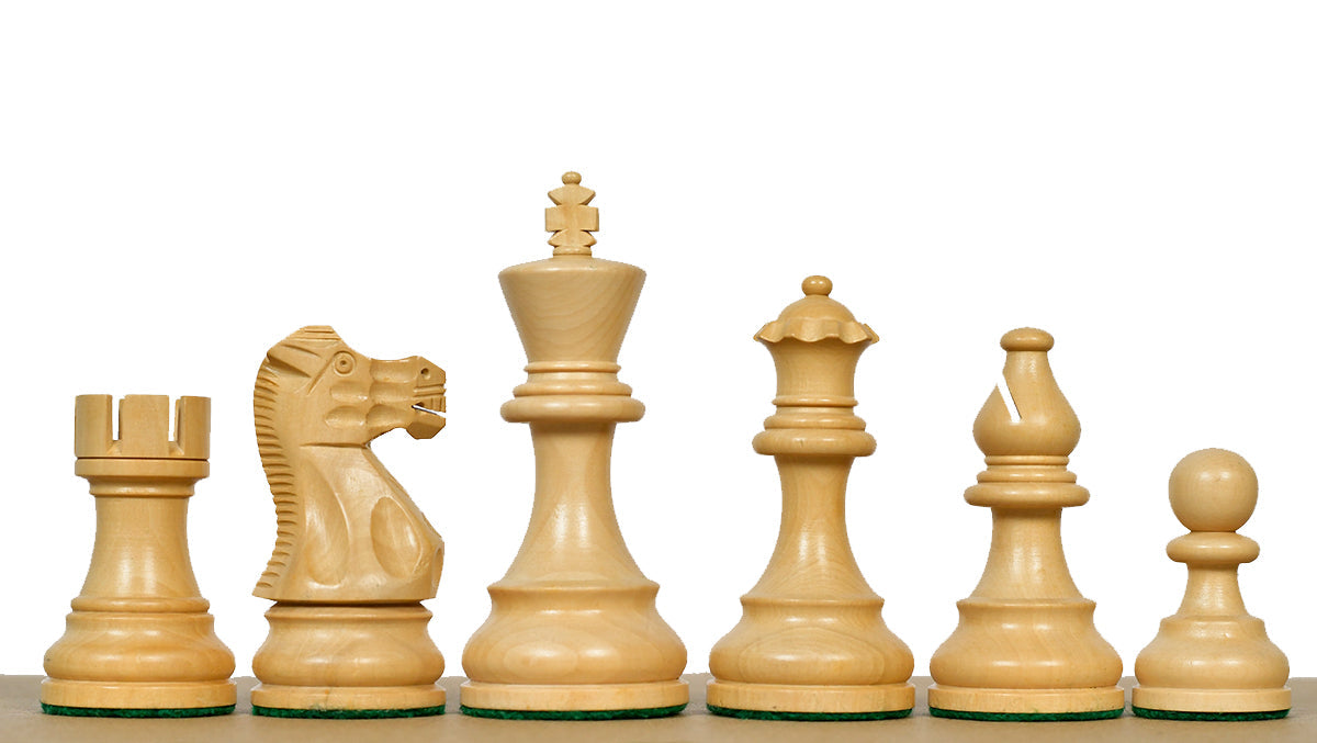 Ebonised chess pieces with a 97mm king and weighted felted bases