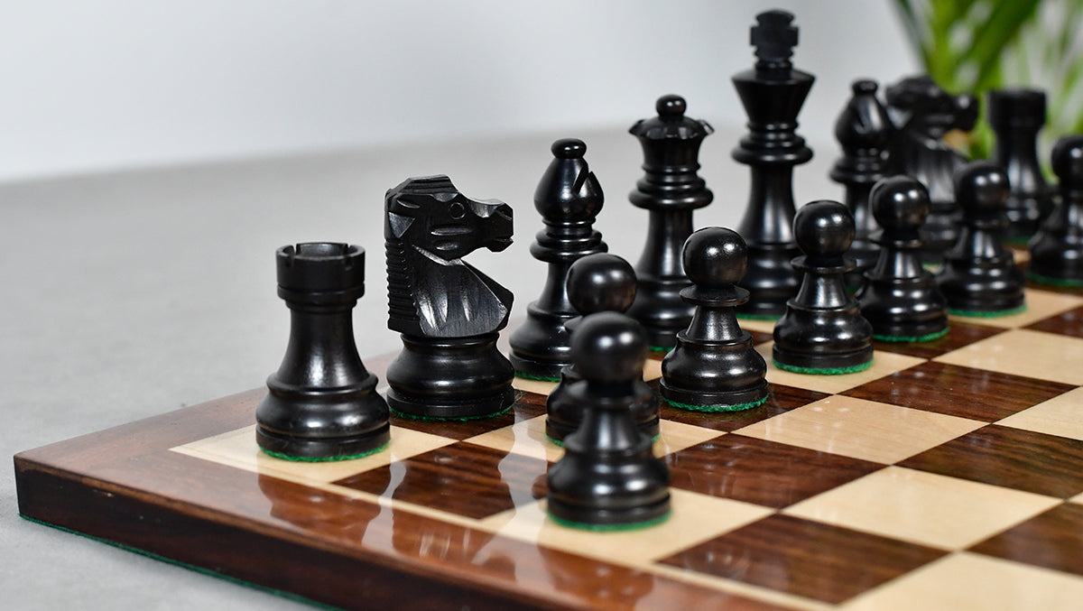 Knight carving detail on the French Lardy Compact chess pieces in ebonised and natural boxwood