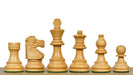 Ebonised chess pieces with a 76mm king and weighted felted bases