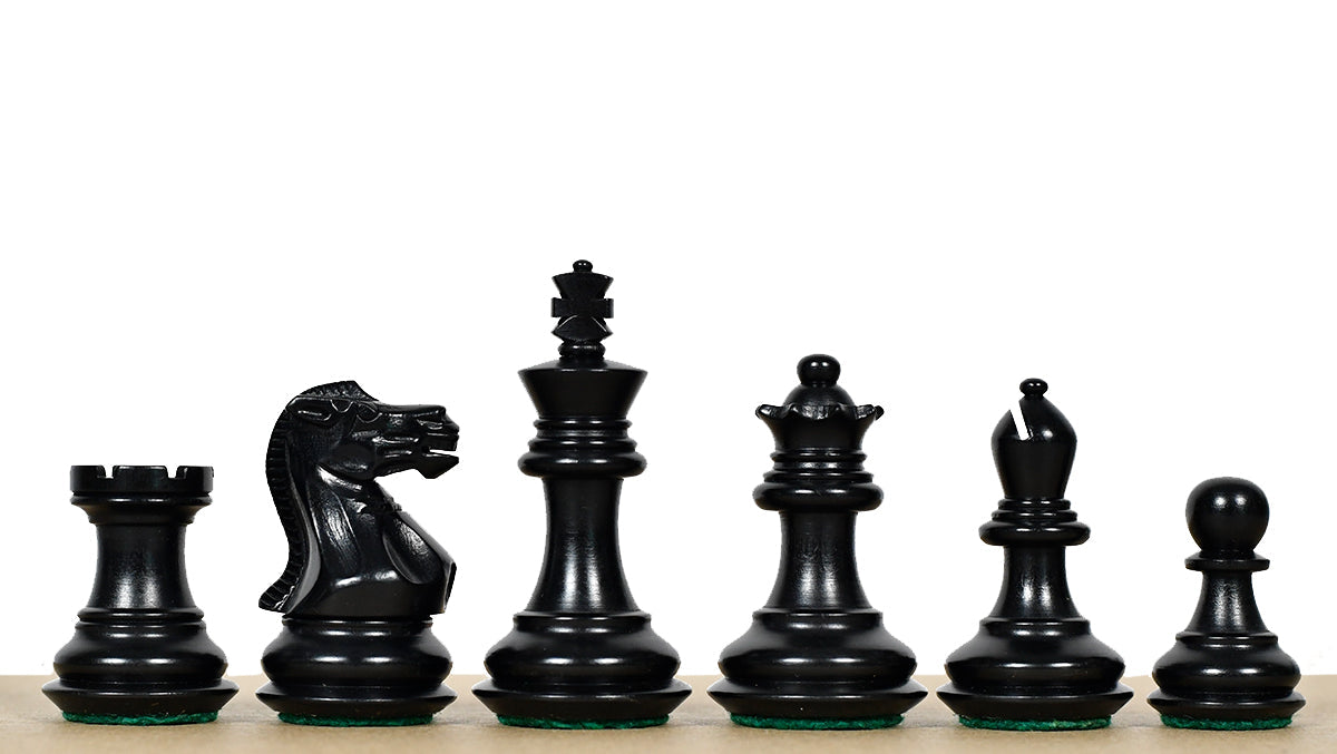 Handcarved Staunton chess pieces in ebonised and natural boxwood, 66mm king