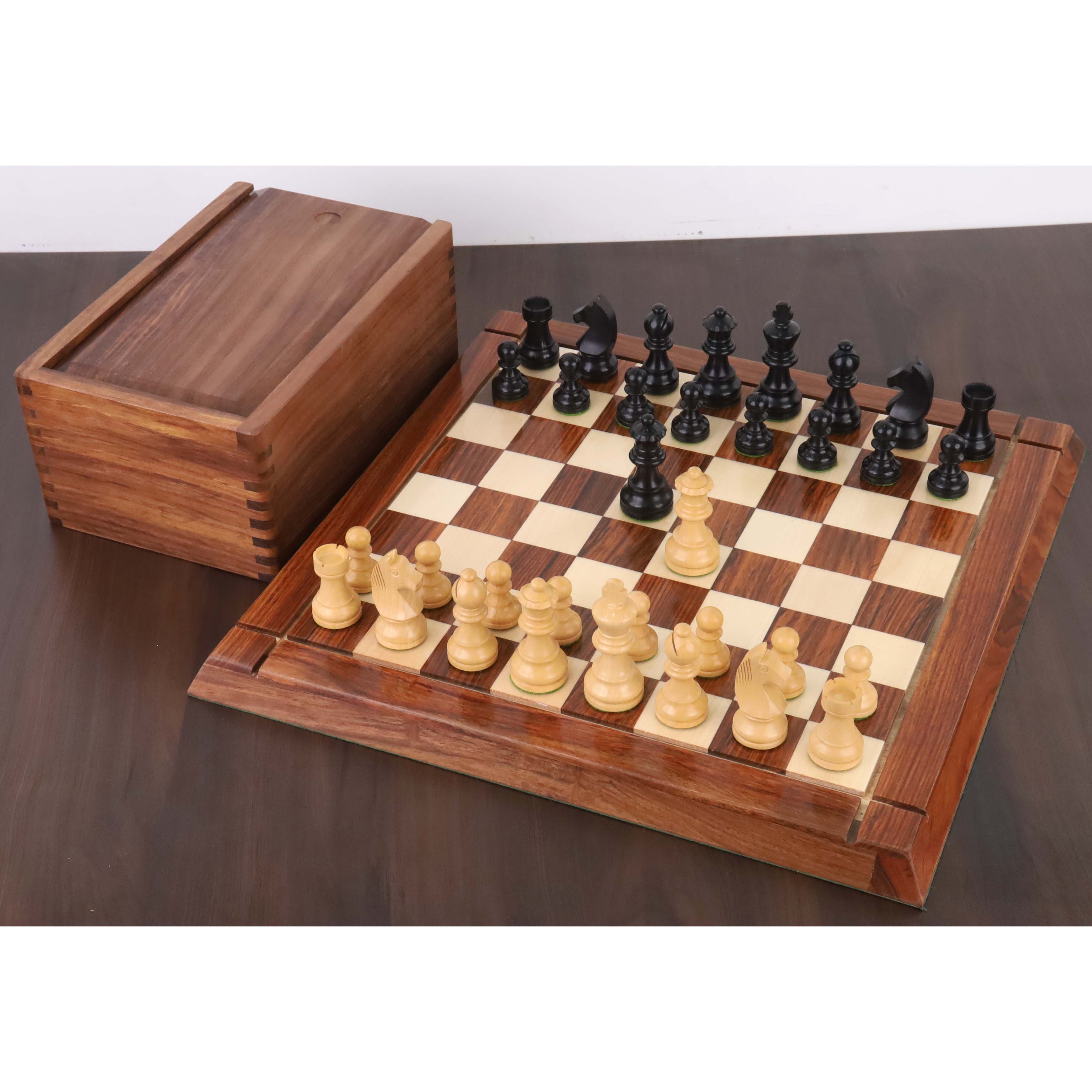 34 piece ebonised boxwood chessmen set