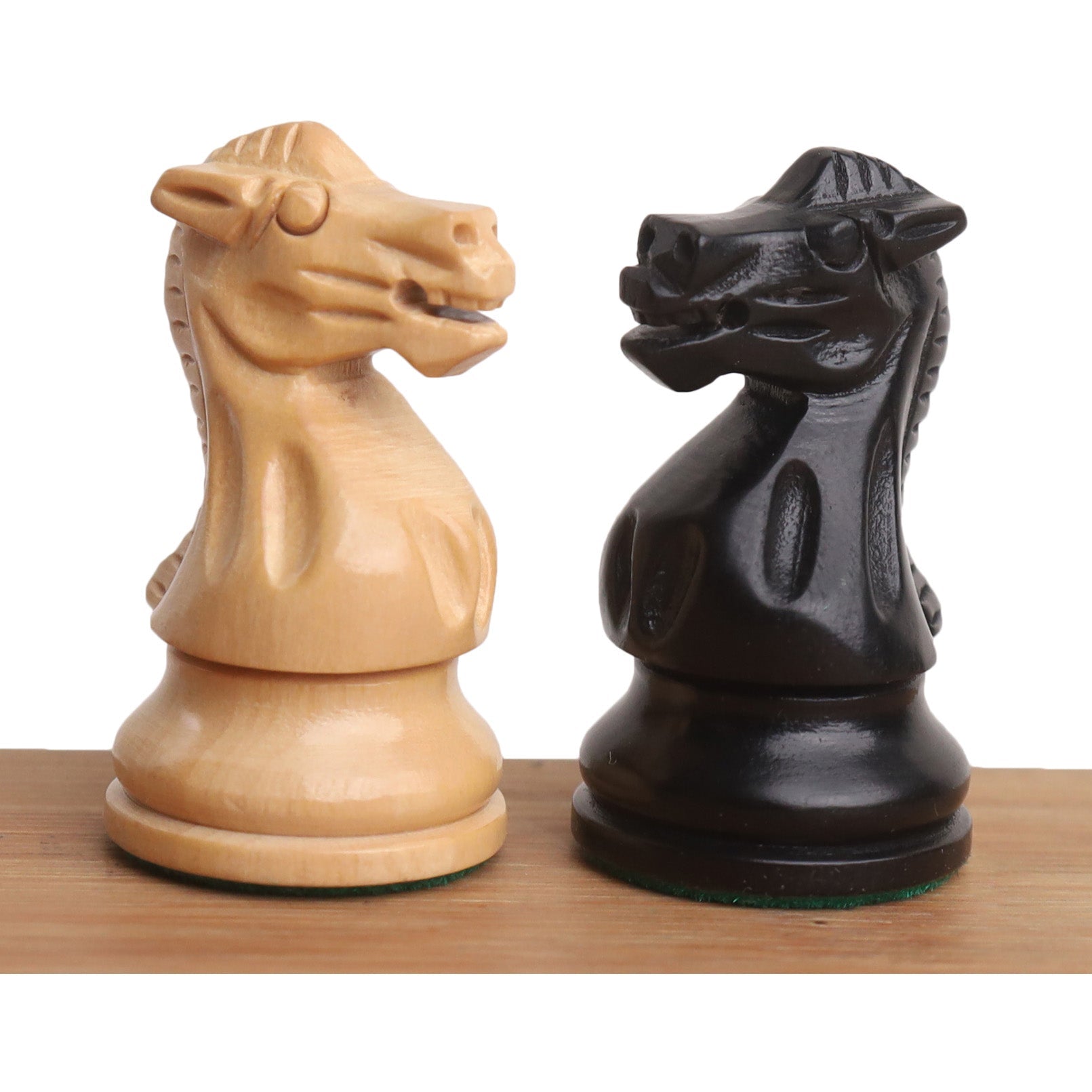 34 piece ebonised boxwood chessmen set
