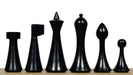 Hermann Ohme Minimalist chess pieces, ebonised and natural boxwood, hand carved in India