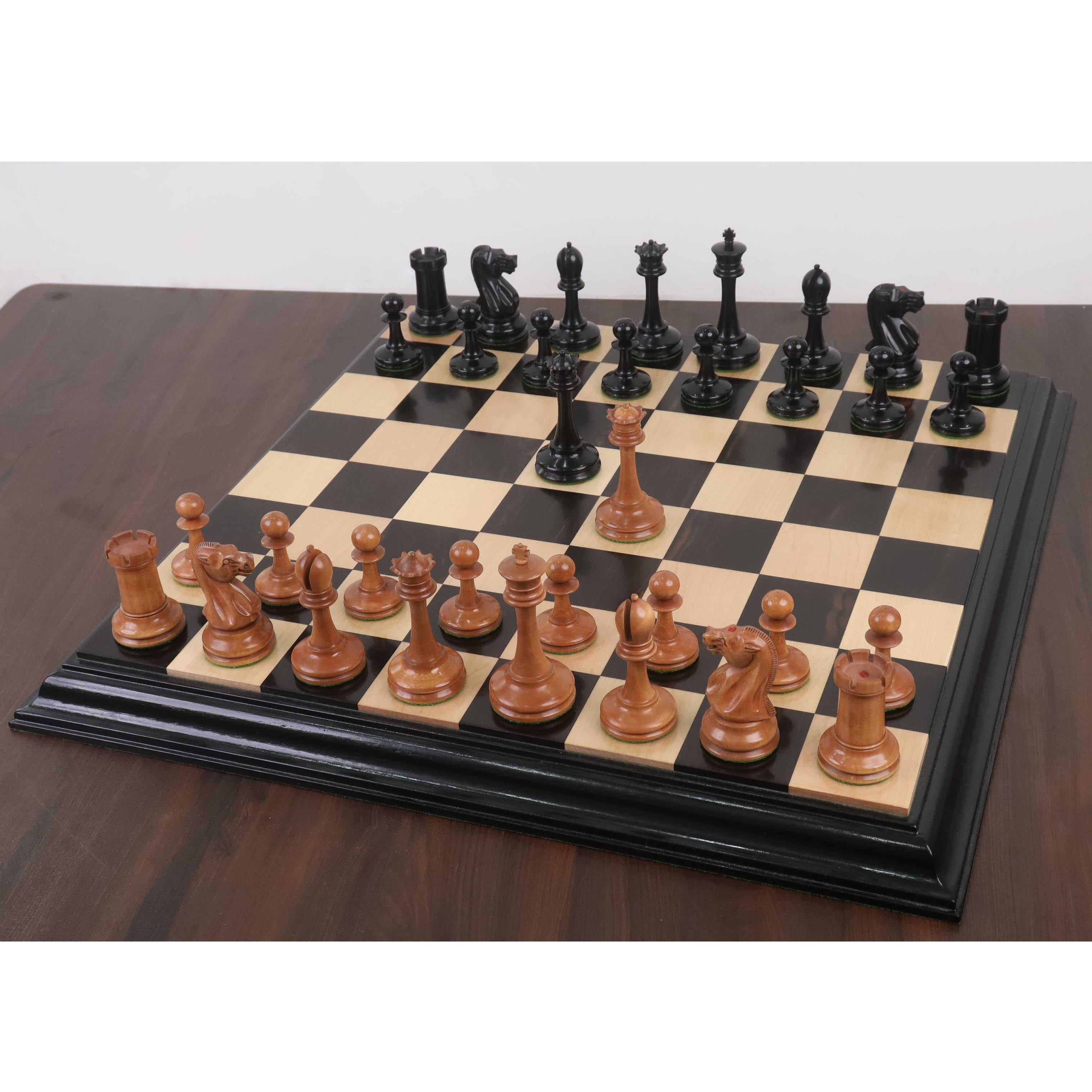 Ebony Wood and Antiqued Boxwood chessmen, 107mm king on a 49mm base