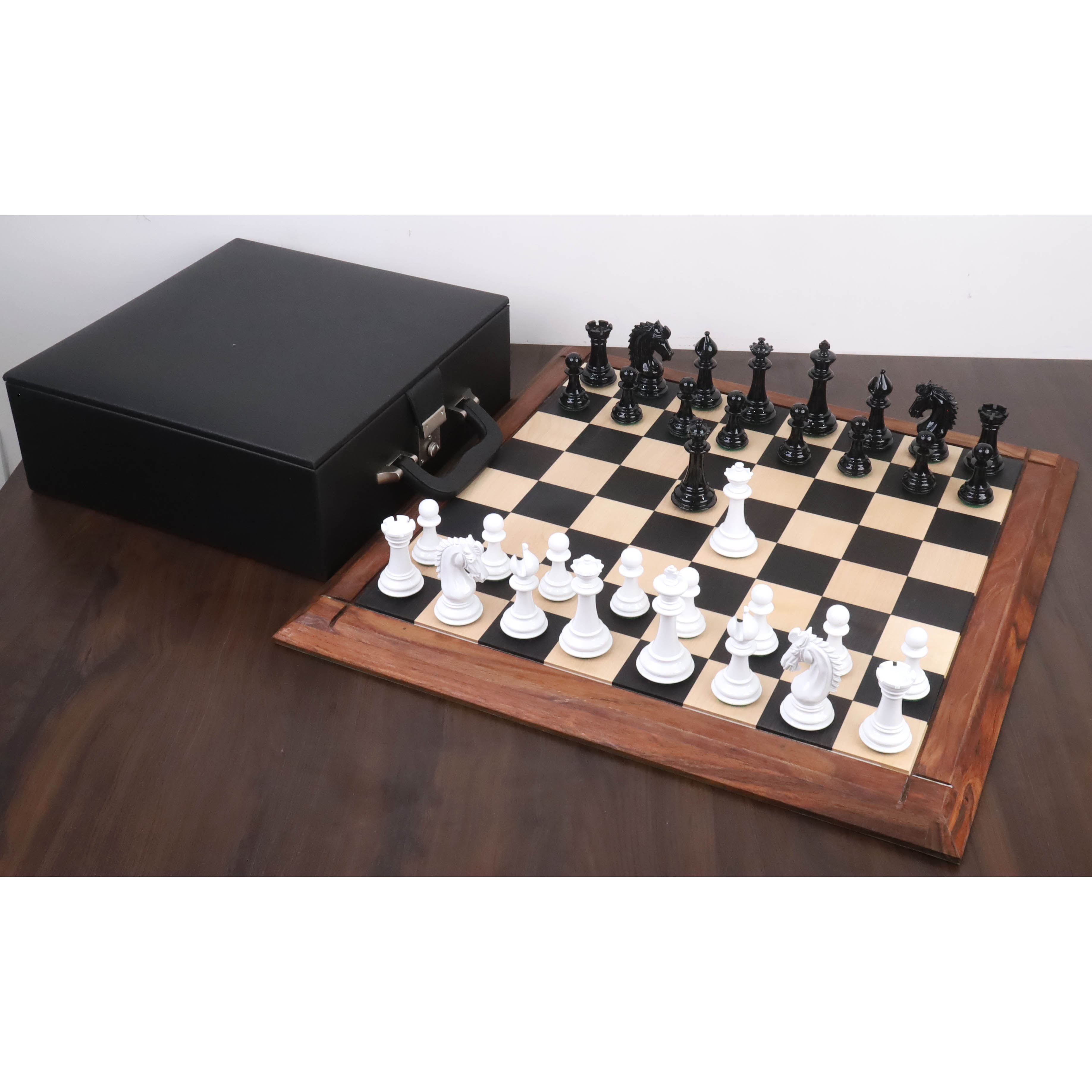 34 piece lacquered black boxwood and lacquered white boxwood chessmen set