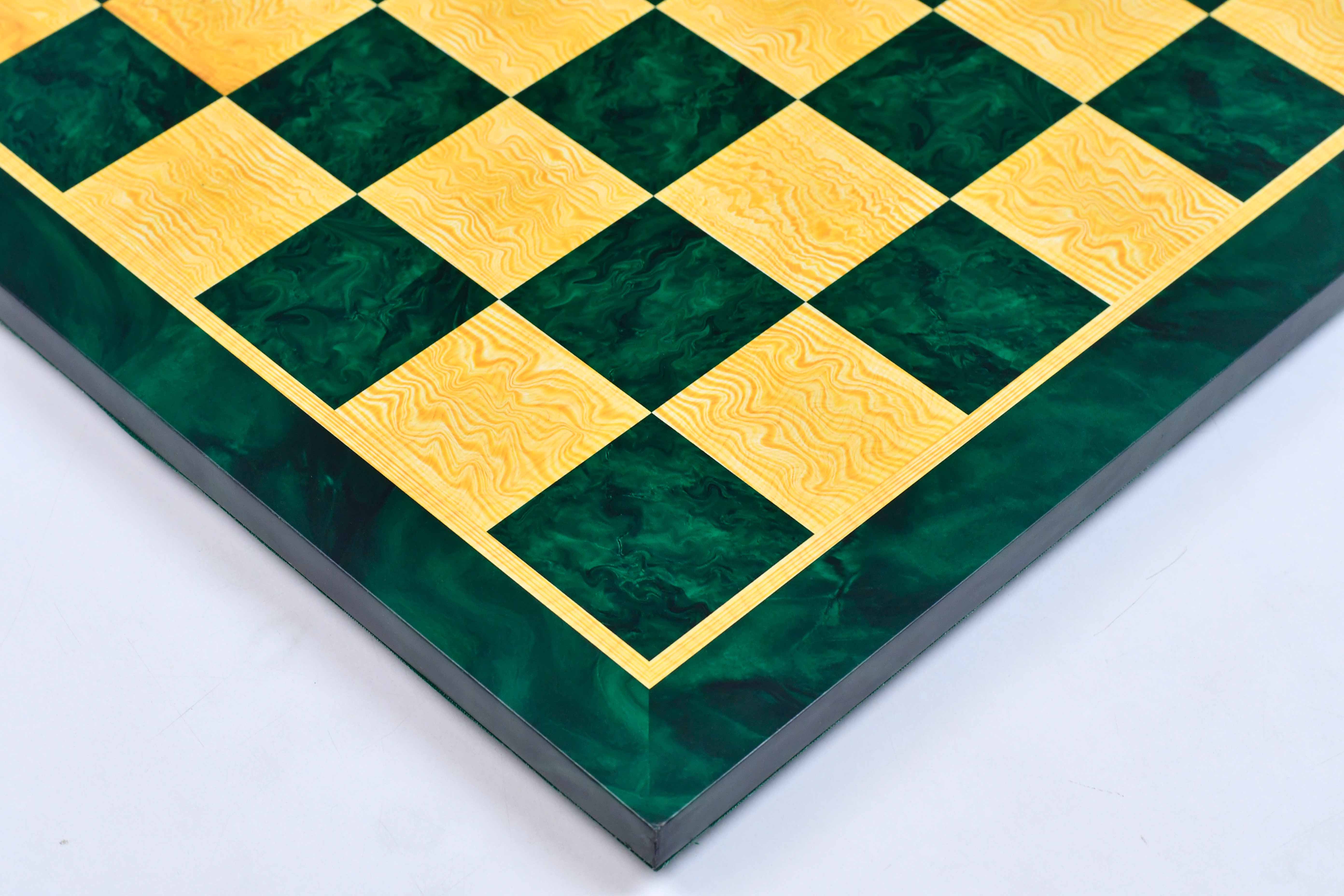 Green burl tournament chess board photographed from above