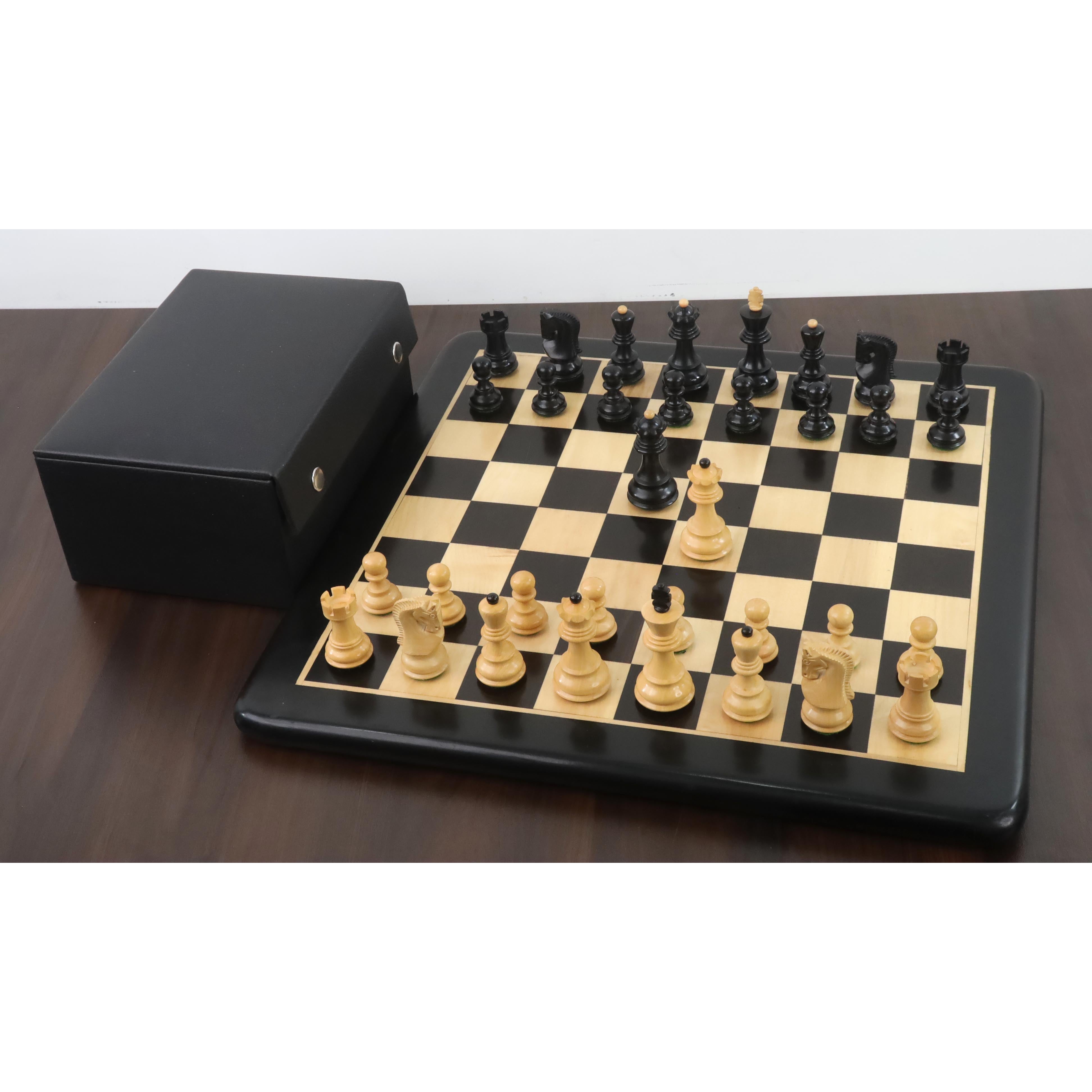 34 piece ebonised boxwood chessmen set