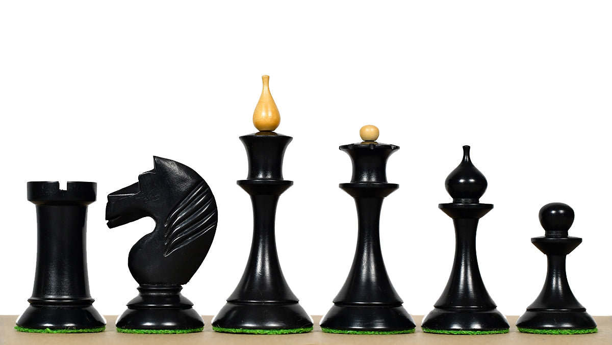 1950s Soviet Latvian chess pieces in ebonised & natural, 106mm king