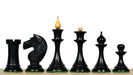 1950s Soviet Latvian chess pieces in ebonised & natural, 106mm king
