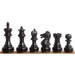Ebonised chessmen sized for 45 to 50 mm squares
