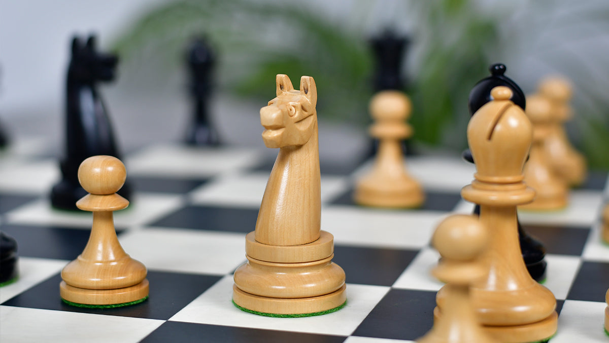 Knight carving detail on the 1904 American Chess Co. chess pieces in ebony and natural boxwood