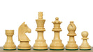 Ebonised chess pieces with a 77mm king and weighted felted bases