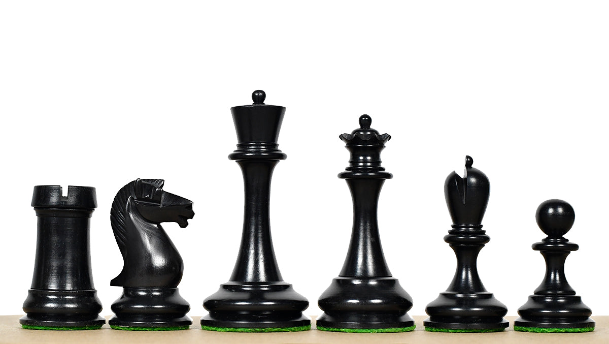 Genuine ebony chess pieces with a 100mm king and weighted felted bases