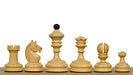 Ebonised chess pieces with a 74mm king and weighted felted bases