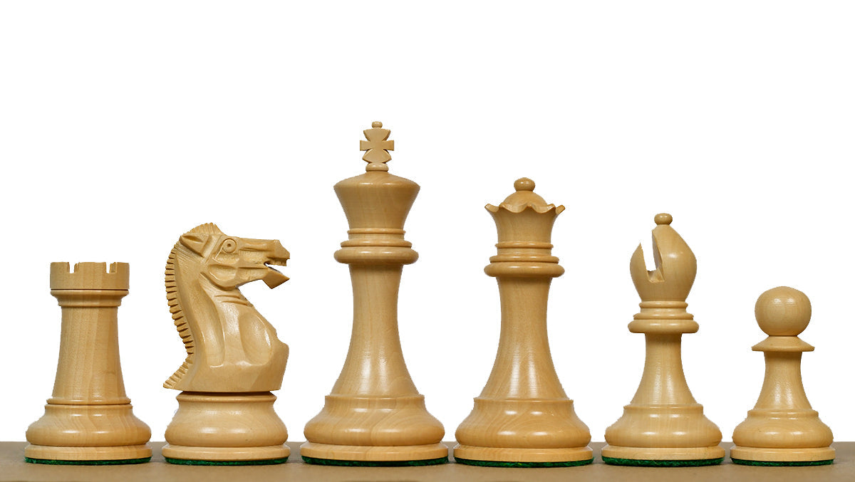 Ebonised chess pieces with a 98mm king and weighted felted bases
