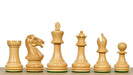 Ebonised chess pieces with a 78mm king and weighted felted bases
