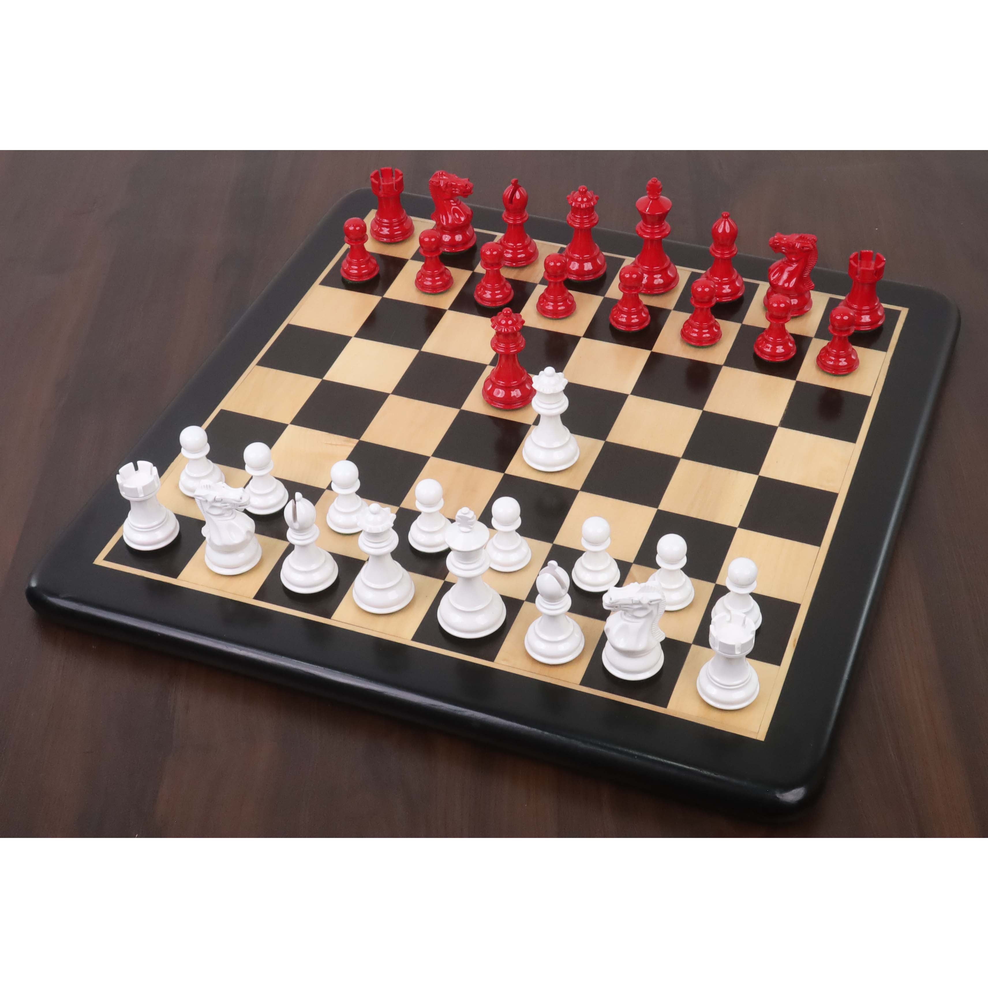 76mm king and matching chessmen in Red Painted Boxwood and White Painted Boxwood
