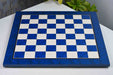 Blue burl tournament chess board at an angle