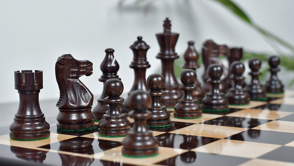 Knight carving detail on the Smokey Staunton chess pieces in rosewood and boxwood