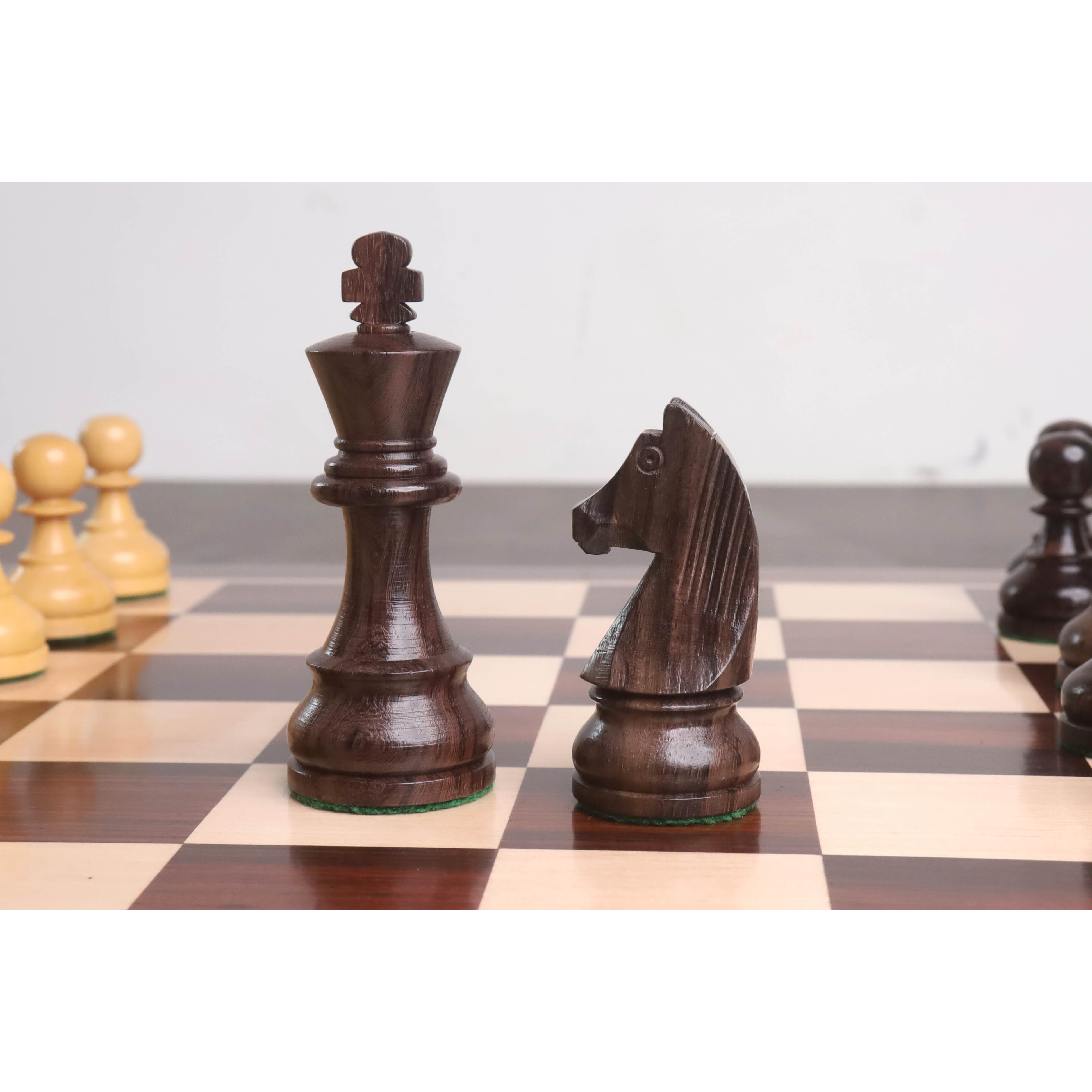Knight and rook from the rosewood chessmen