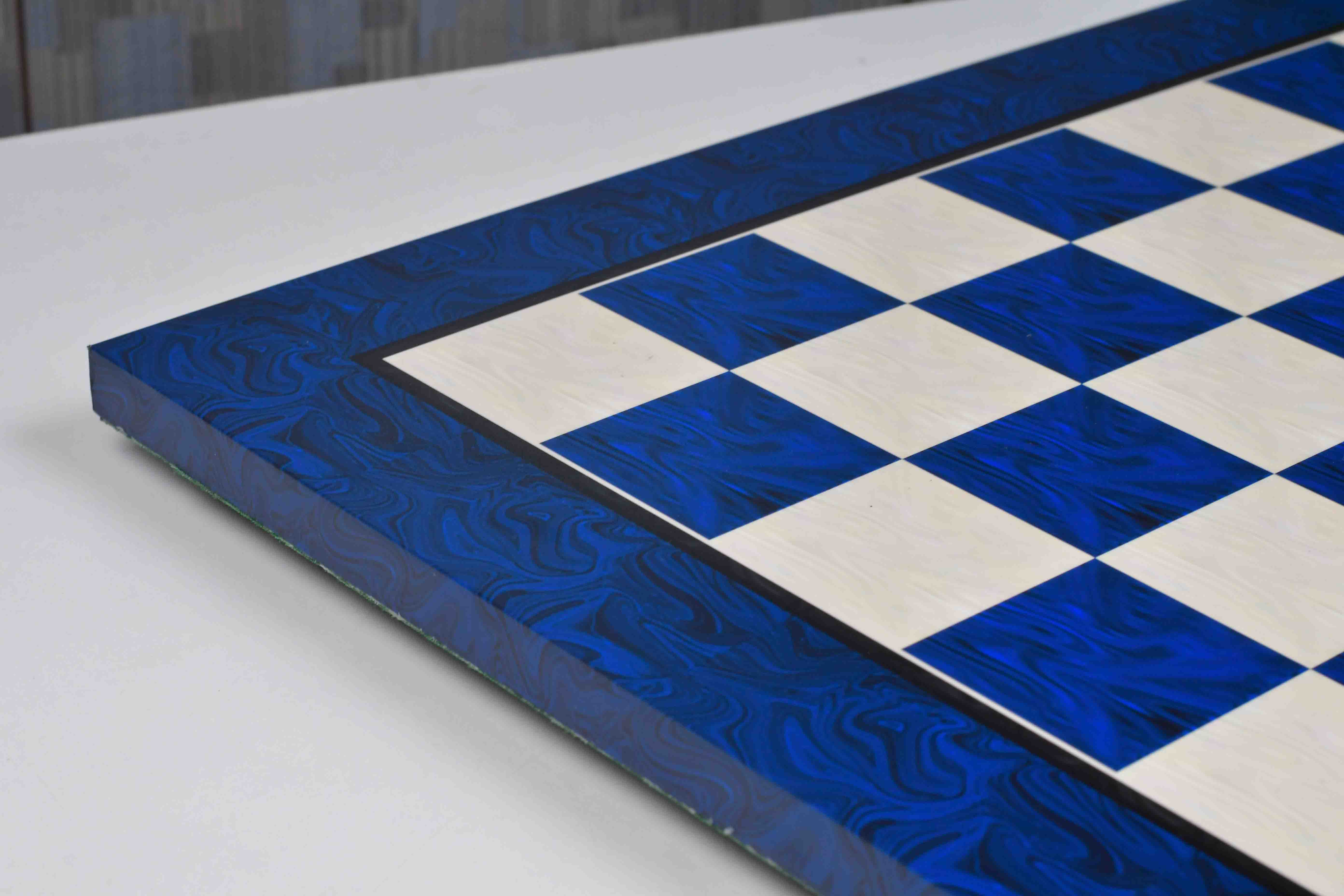 Blue burl chess board showing its 19mm thickness