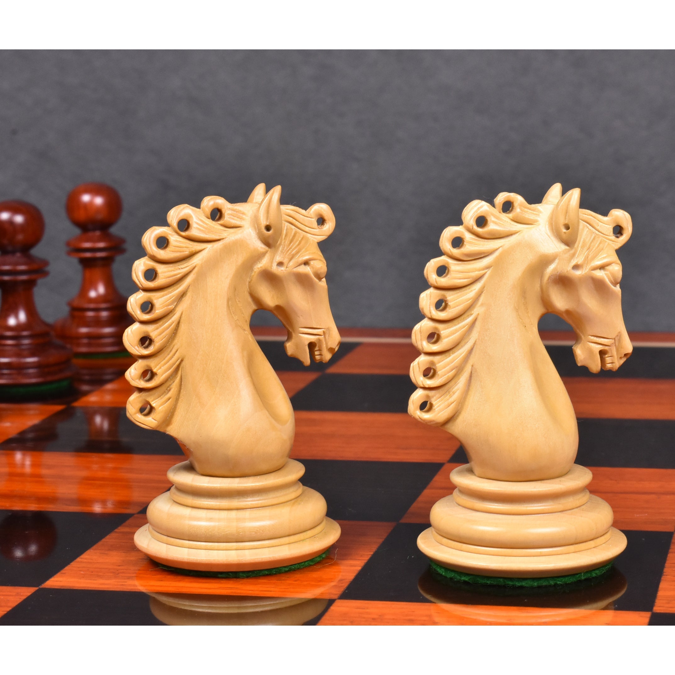 Carvers' Art chess pieces in bud rosewood, 114mm king