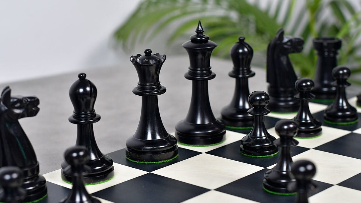 Full 34 piece 1904 American Chess Co. chess set in ebonised and antique boxwood, Sterling Chess Australia