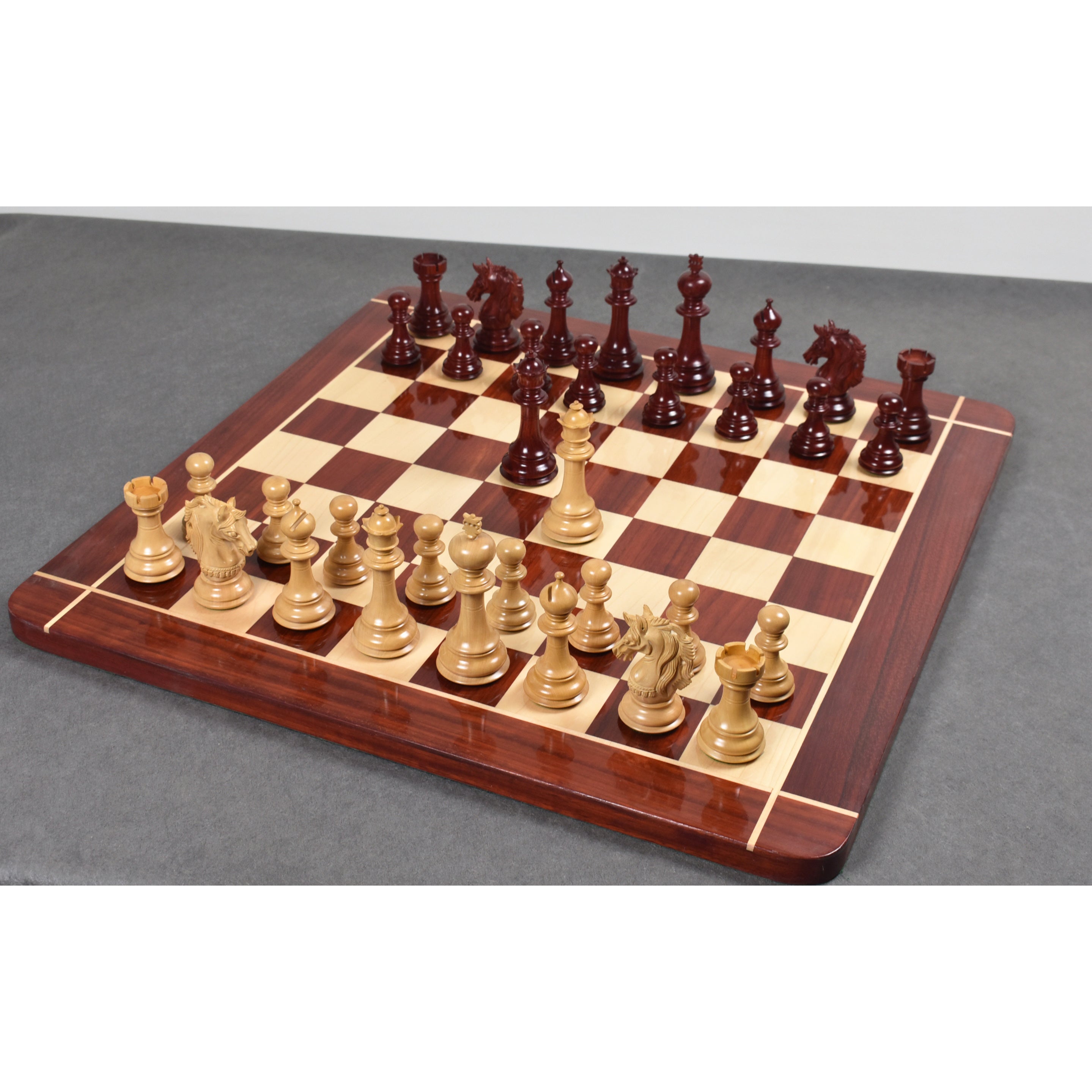 Prestige Staunton chess pieces in bud rosewood, 118mm king