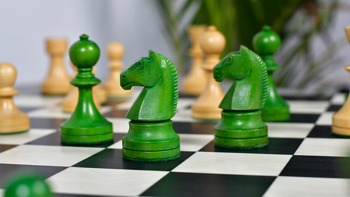 Knight carving detail on the Soviet Era chess pieces in stained green ash burl and boxwood