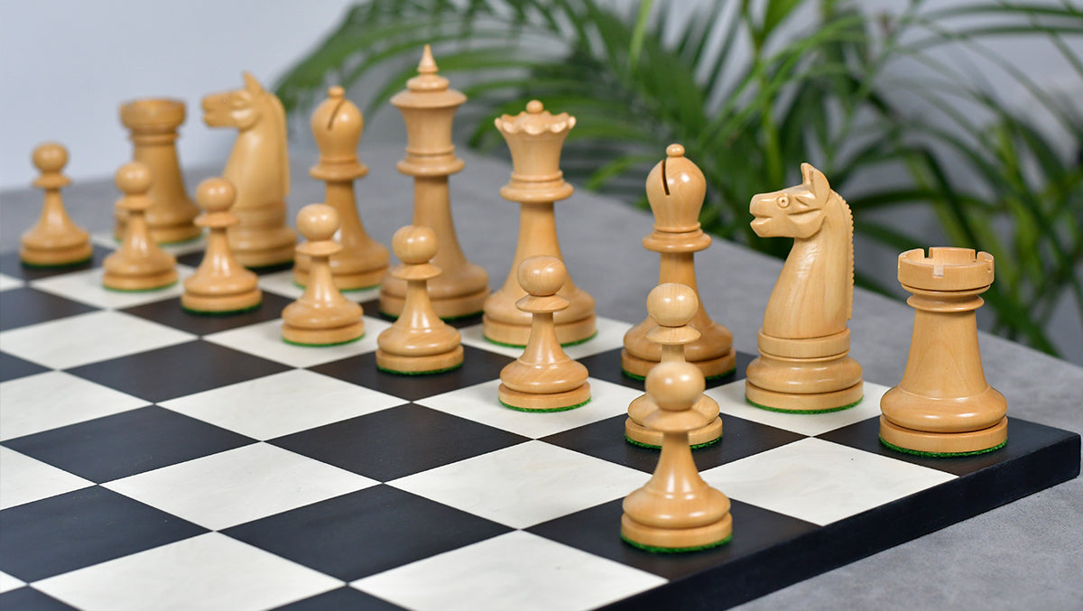 Ebony chess pieces with a 97mm king and weighted felted bases
