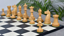 Ebony chess pieces with a 97mm king and weighted felted bases