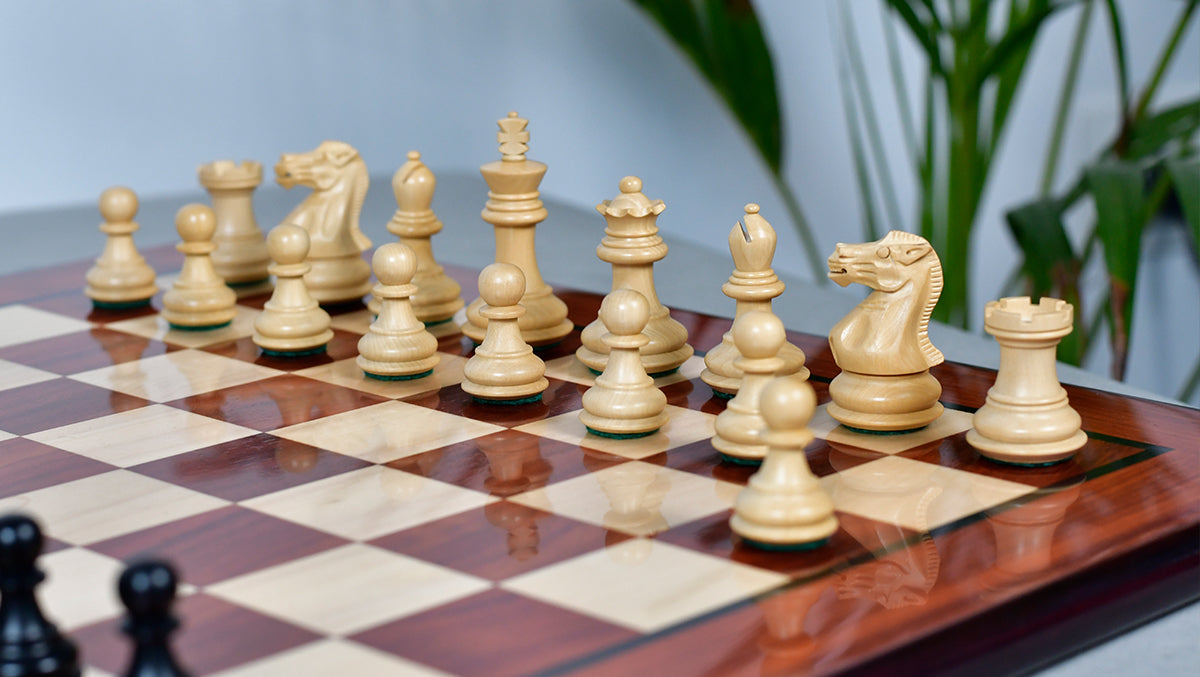 Handcarved boxwood Staunton chess pieces with a 32mm king base diameter