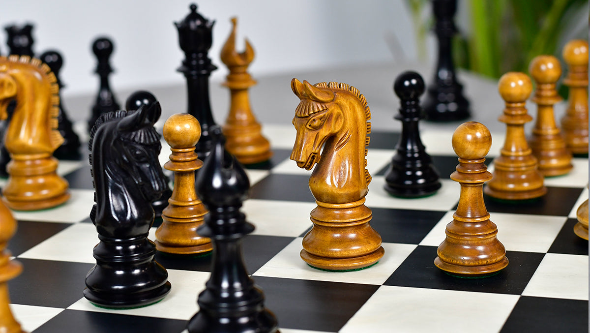 Ebony War Admiral Staunton chess pieces with weighted bases and a 112mm king