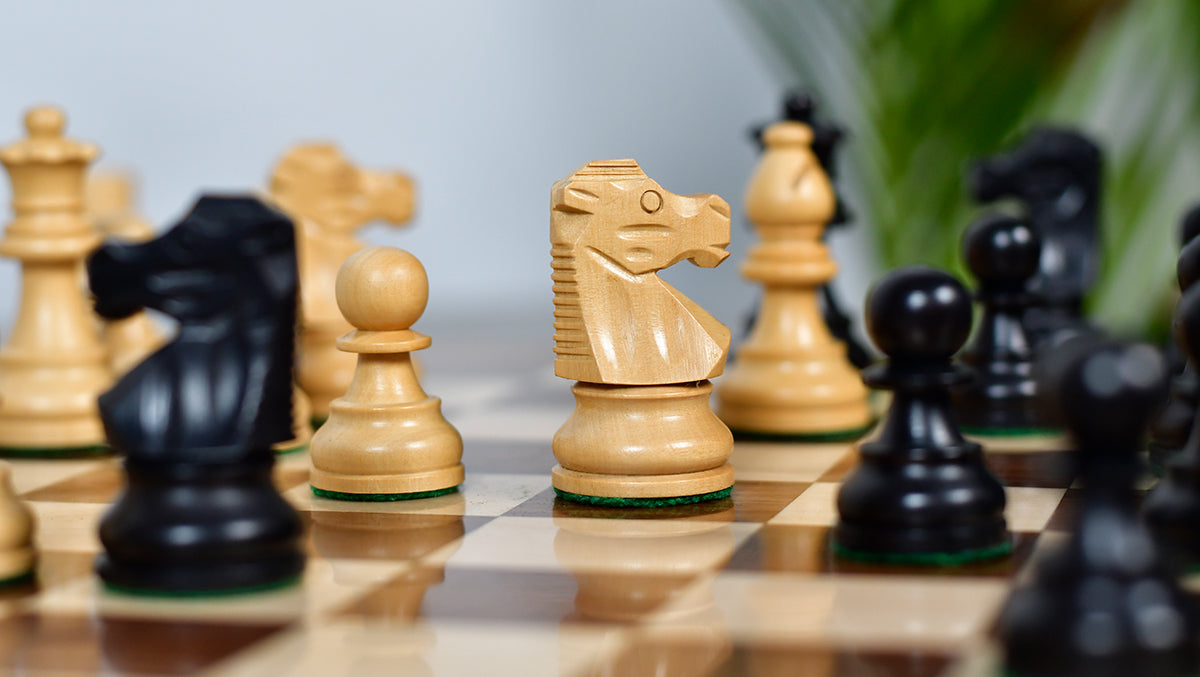 Full 34 piece French Lardy Compact chess pieces in ebonised and natural boxwood, Sterling Chess Australia