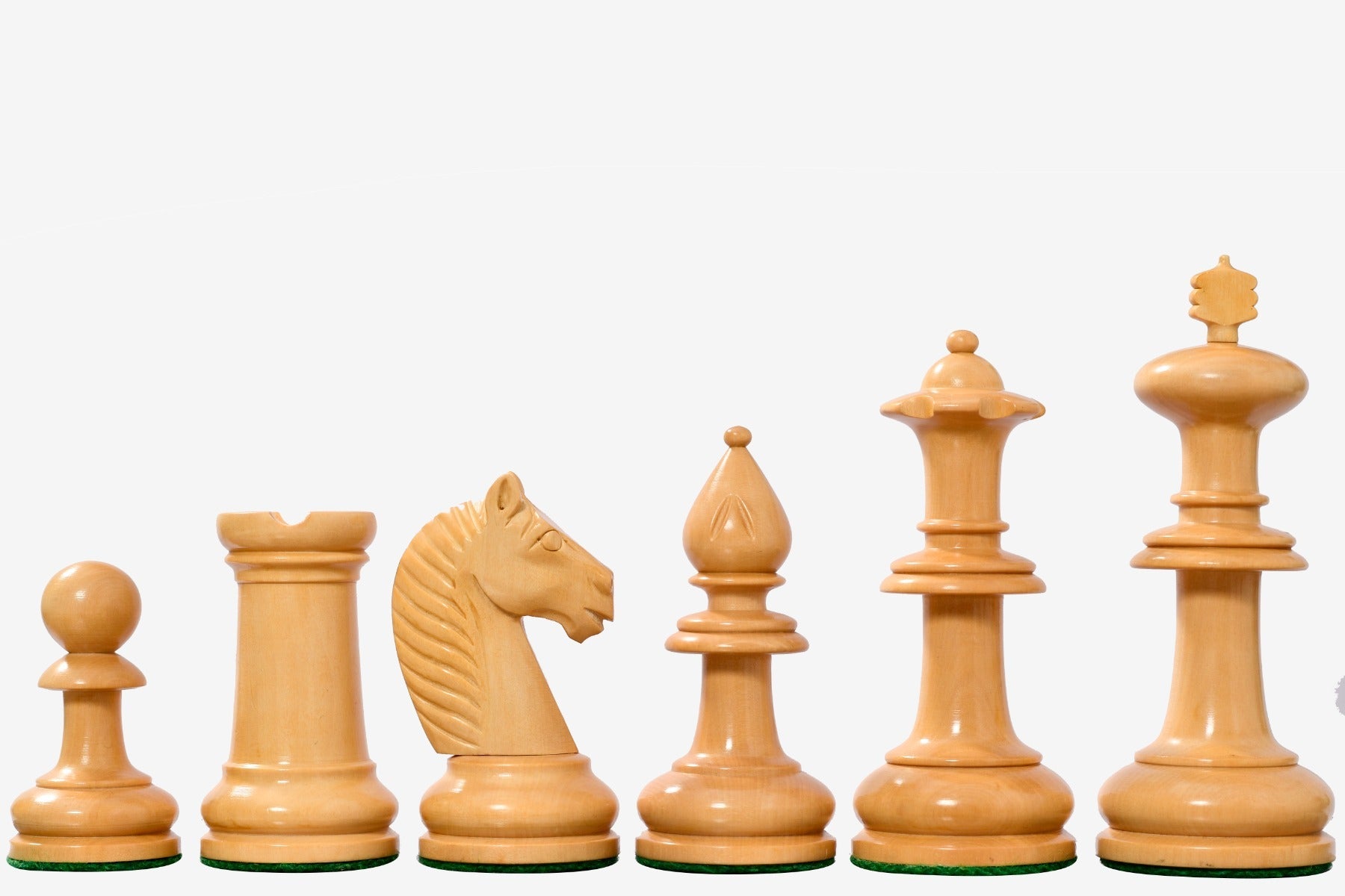 Ebonised and natural boxwood chess pieces with a 108mm king and iron weighted bases