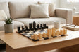 Knight carving detail on the 1966 Lanier Graham chess pieces in ebonised and natural boxwood