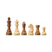 Set of wooden chess pieces on a white background